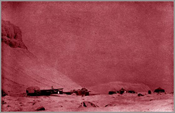 Our huts by moonlight in winter